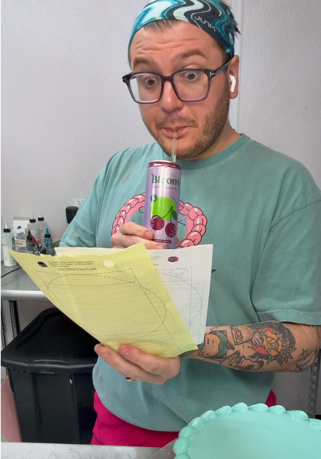 A post by @trashyqweenz on TikTok caption: Shape up or ship out💅 We got cakes on cakes & a tank full of caffeine and chaos!  #customcakes #fueledbyfrosting #fueledbyBloom #BloomPartner @Bloom Nutrition 