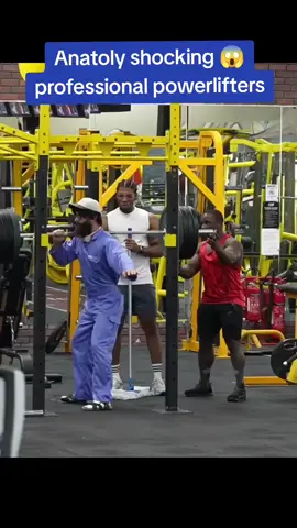 A post by @anatolyprank on TikTok caption: Anatoly shocking professional powerlifters #gym #anatoly #prank 