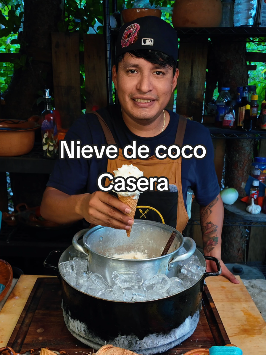 A post by @cocineroenproceso on TikTok caption: ¡Nieve de Coco Casera y Artesanal! Ingredientes : 3 cocos 1. 5 litros de agua de coco 2 latas de leche evaporada 300 gr de azúcar o al gusto 2kg de sal de grano 4 bolsas de hielo Mucha fuerza en el brazo #yosoycocinero #recetas #recetasmexicanas #comidamexicana #recetafacil #nievedegarrafa #nievedecoco #nieve #heladoartesanal 