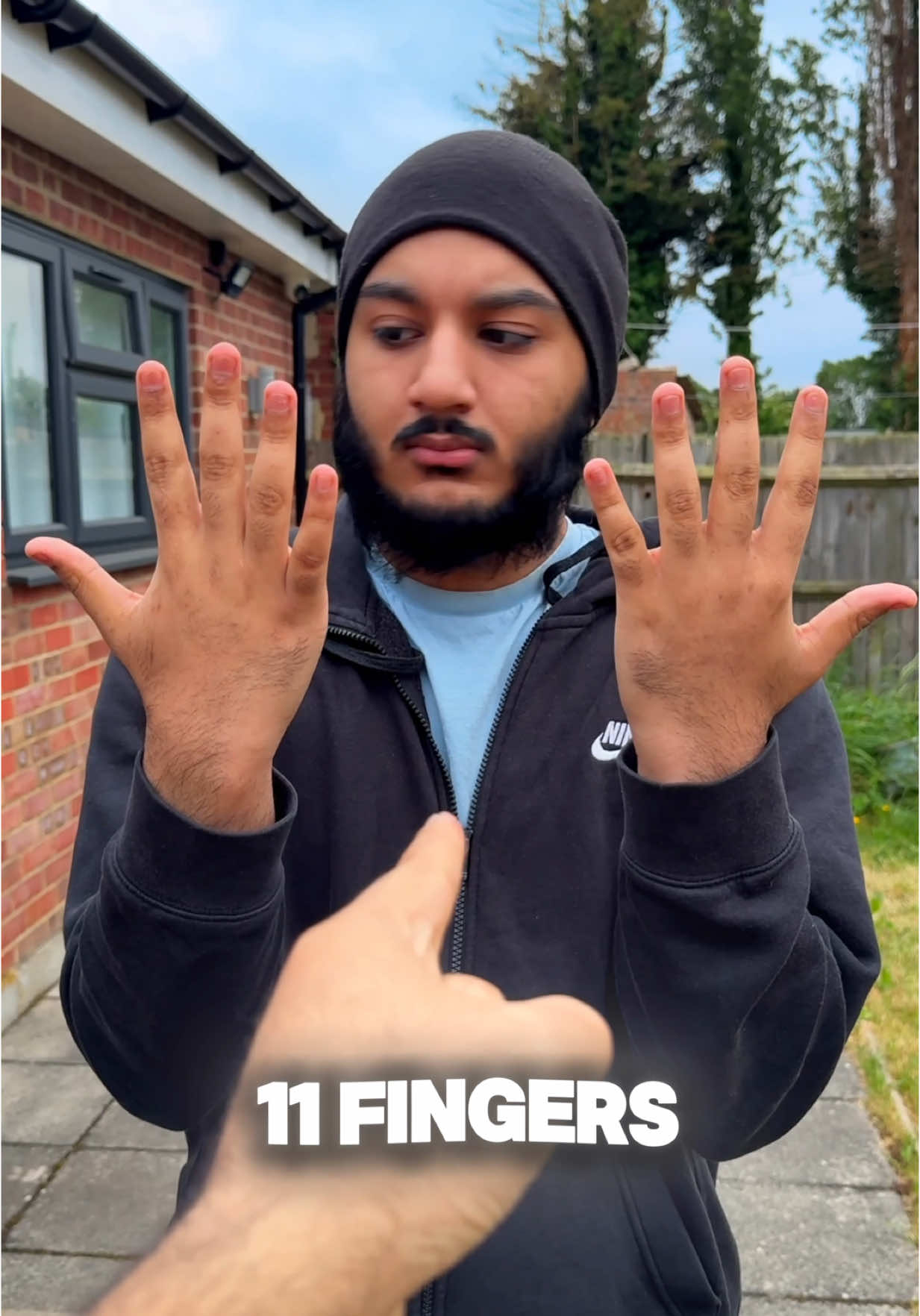 A post by @arshsoni on TikTok caption: You have 11 FINGERS! 😱🤣 (How) Follow for more! ✨ #magic #trick #wow #how #illusion #confusing #math #arshsoni 