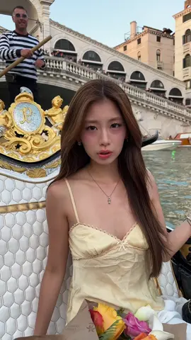A post by @monakoaa on TikTok caption: my first time in italy🇮🇹🤍 venice is so prettyyyyyyy