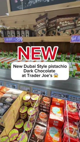 A post by @traderjoesnew on TikTok caption: 🚨Just when I thought I’d tried every chocolate out there… this one stopped me in my tracks. 🤯 Dubai Style Pistachio Dark Chocolate from @traderjoes is rich, crispy, and next-level indulgent  made with 50% Boz Antep Pistachios, crispy kataifi, and dark chocolate. Crafted in Turkey by true chocolate artisans. Only at Trader Joe’s  trust me, you NEED to try this. 10/10 and only $3.99  #TraderJoesFinds #traderjoesmusthaves #DubaiStyleChocolate #ChocolateLoversUnite #traderjoes #traderjoesnew #traderjoesnewitem 
