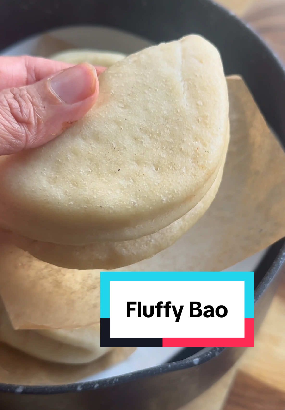 A post by @kauscooks on TikTok caption: Korean Chicken Bao - Part 1: the Bao Recipe: Makes 12 * 400g plain flour * ½ tsp salt * 1½ tsp baking powder * 40g sugar * 7g instant yeast * 230ml warm milk (or half milk, half water) * 4 tbsp oil Method: 1. Mix the milk, oil and warm in the microwave for 30 seconds until lukewarm. (you can sub the milk for half milk, half water if you prefer) 2. In a large bowl, sift in the flour, salt and baking powder. Stir in the sugar and yeast. 3. Add the warm liquid and mix until a shaggy dough forms. Knead for 5 minutes until smooth, or use a stand mixer. 4. Lightly oil a bowl, place the dough inside, cover with cling film and leave in a warm spot for 2 hours or until doubled in size. 5. Punch down the dough and roll it out to 1 inch thick. Cut out circles using a cookie cutter or glass. Re-roll the scraps to use up all the dough. 6. Cut small squares of baking paper. Brush each circle with oil, fold in half, place on the paper, and gently press to flatten. Rest for 30 minutes until slightly risen. 7. Steam for 8-10 minutes in a bamboo steamer, or use a DIY setup: place an upside-down heatproof bowl in a saucepan, top with a smaller heatproof plate, add water to the saucepan and steam the bao with the lid on. 8. To freeze for later, after steaming, wait for them to completely cool down. Freeze in a single line on a flat surface, then transfer to a ziplock bag after 2 hours, then to reheat, either steam from frozen for 5-6 minutes or wrap in a damp kitchen towel and microwave for 2 minutes. #bao#baoobuns #koreanfriedchicken 