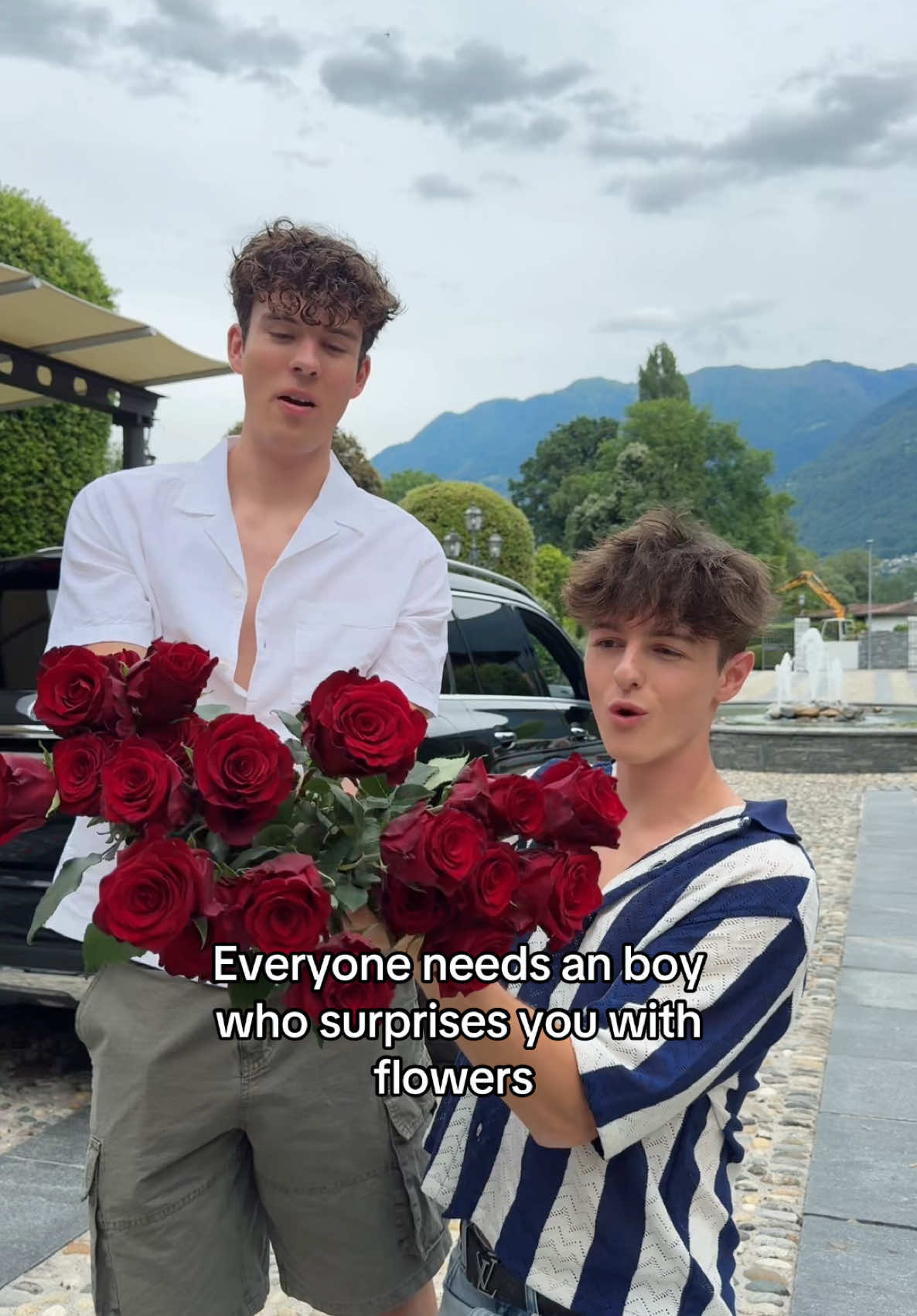 A post by @boysonvacation on TikTok caption: Love red roses 😍 #boyfriends #favourite #snack 