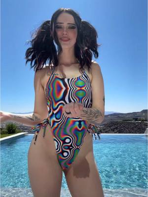 A post by @undeadem on TikTok caption: What do you think of my swimsuit!👀🖤