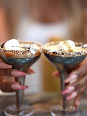 A post by @jackieaina on TikTok caption: My signature drink 🍸 🍫 s’mores espresso martini. it tasted YUMMERS with this Mexican Vanilla Bean syrup I just bought from @Caribe and Co 10 out of 10 omg #espressomartini #smoresespressomartini #espressomartinirecipe 