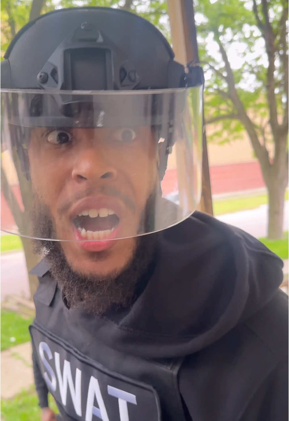 A post by @jackfunny313 on TikTok caption: When the police struggle to knock a door down🤣 #jackfunny313 #police #swat 