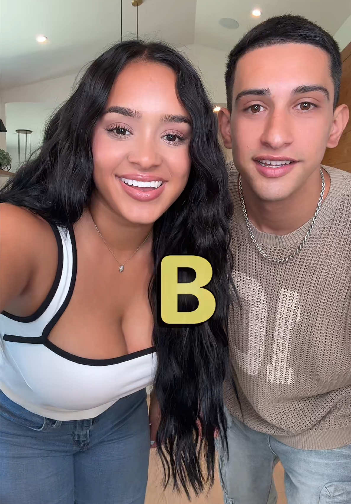 A post by @isaacandandrea9 on TikTok caption: Who wins?😂 #fyp #viral #couple 