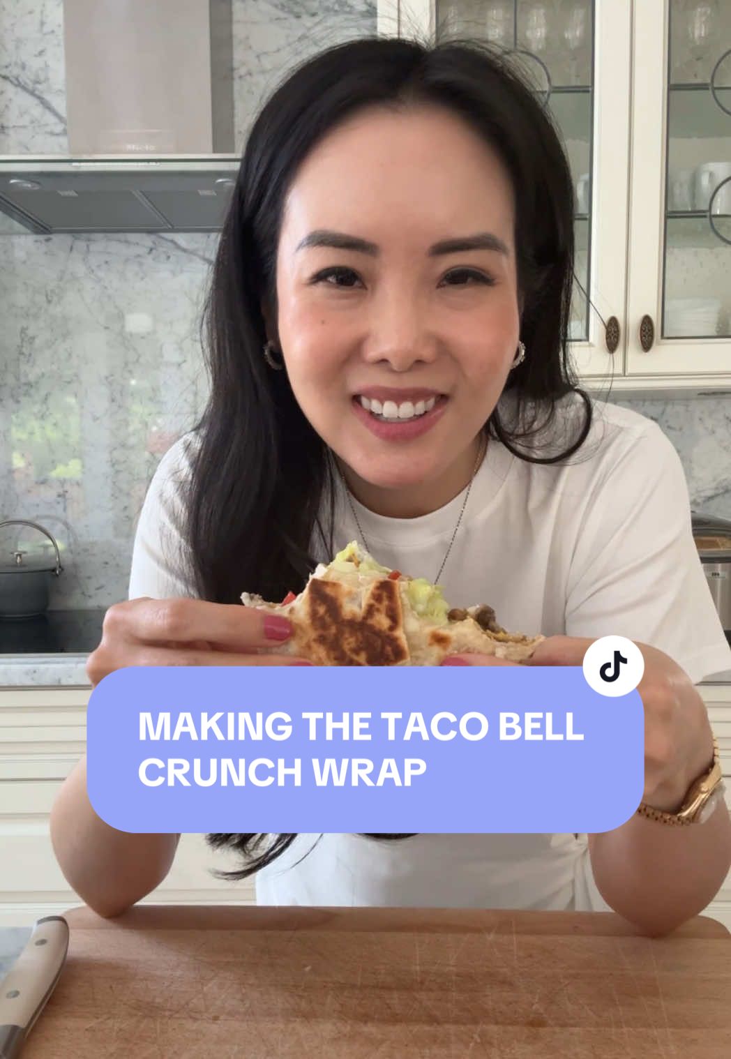 A post by @ongsquad on TikTok caption: How to make the Taco Bell Crunch Wrap #TacoBell #CrunchWrap #Burritos #Homemade #CookingWithKids #EasyDinner 