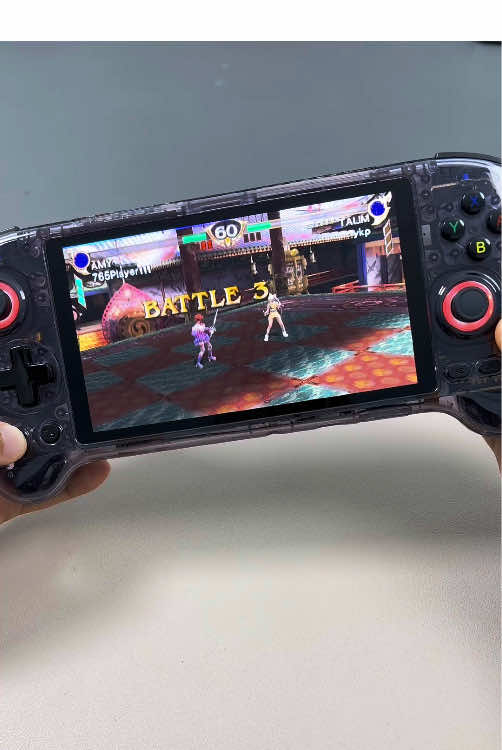 A post by @anbernic_official_usa on TikTok caption: #anbernic #handheldgaming #tiktokgaming #tiktokshoprestock #retro #retrogaming #anbernicrg557 