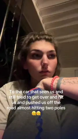 A post by @shayyyy2124 on TikTok caption: We’re all okay just all shook up. We were in the right lane and the car was in the left lane side-by-side to us. We could literally see in their car and they still proceeded to try to get in our lane and pushed us off the road and we almost hit two poles and then proceeded to try to get in front of us and we spun the babies are fine an so are we 