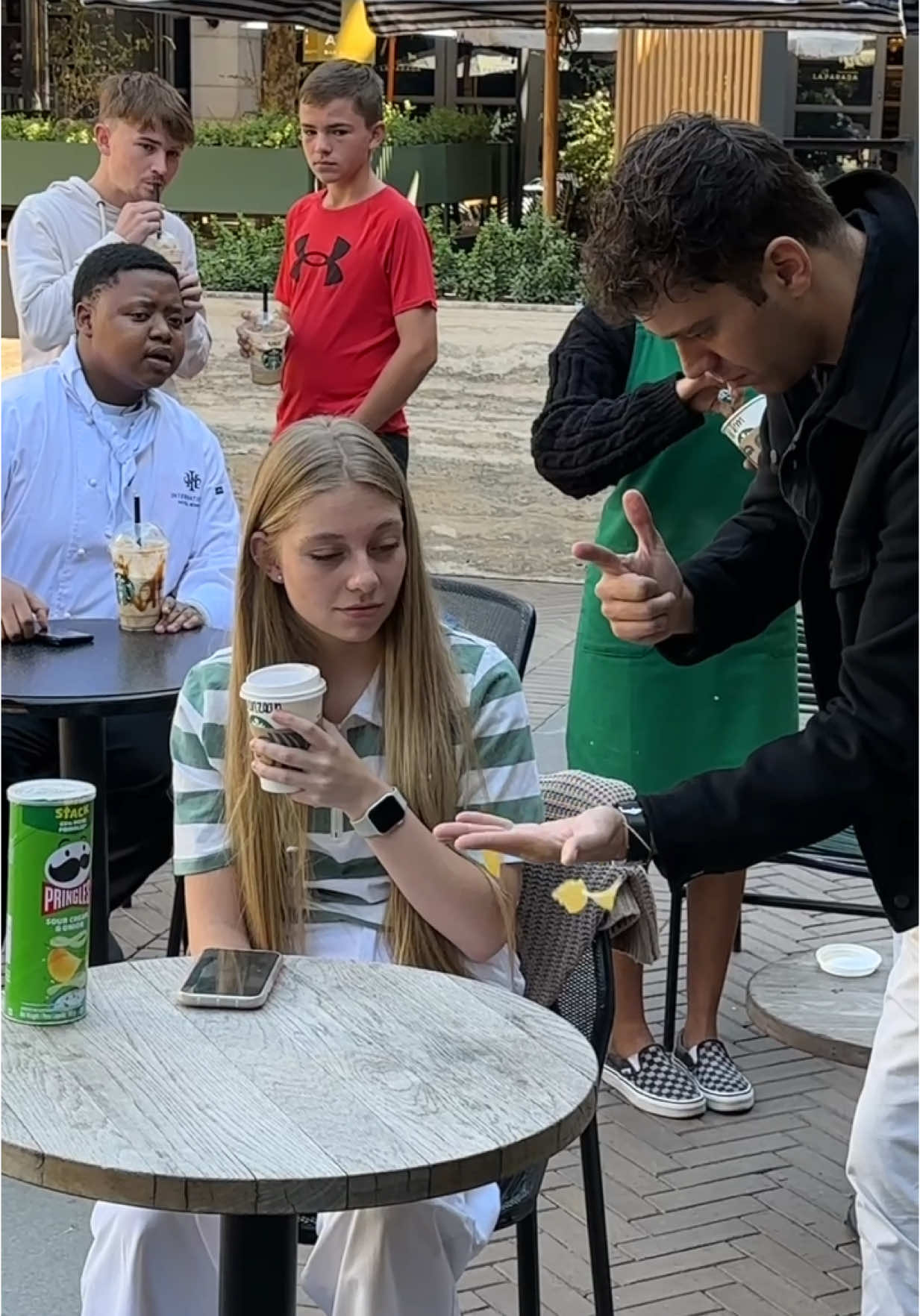 A post by @wian on TikTok caption: The exploding pringle trick 🤯😂 #tiktoksouthafrica🇿🇦 @marizaan🦖 #fyp #magic #trick #tiktoksa 