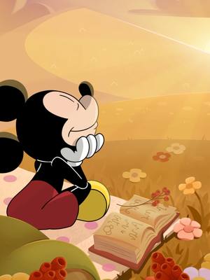 A post by @disney on TikTok caption: Even Mickey takes time to slow down and just be. 🌅 What is your favorite way to unwind?