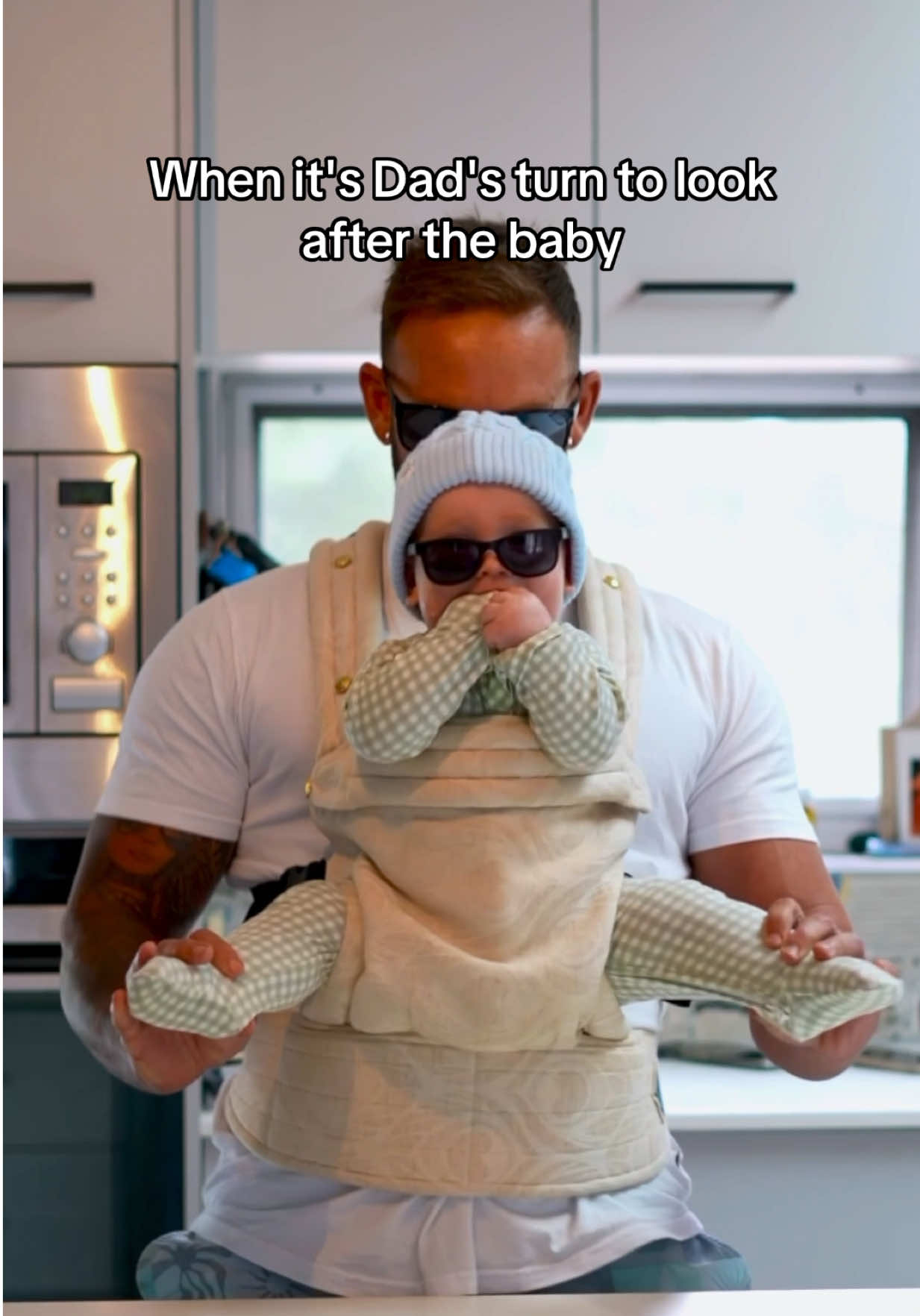 A post by @joelbushby on TikTok caption: He’s hot then he’s cold… and I just try to keep up 🤪 #vibes #dadlife #babybonding #dancechallenge #fyp 