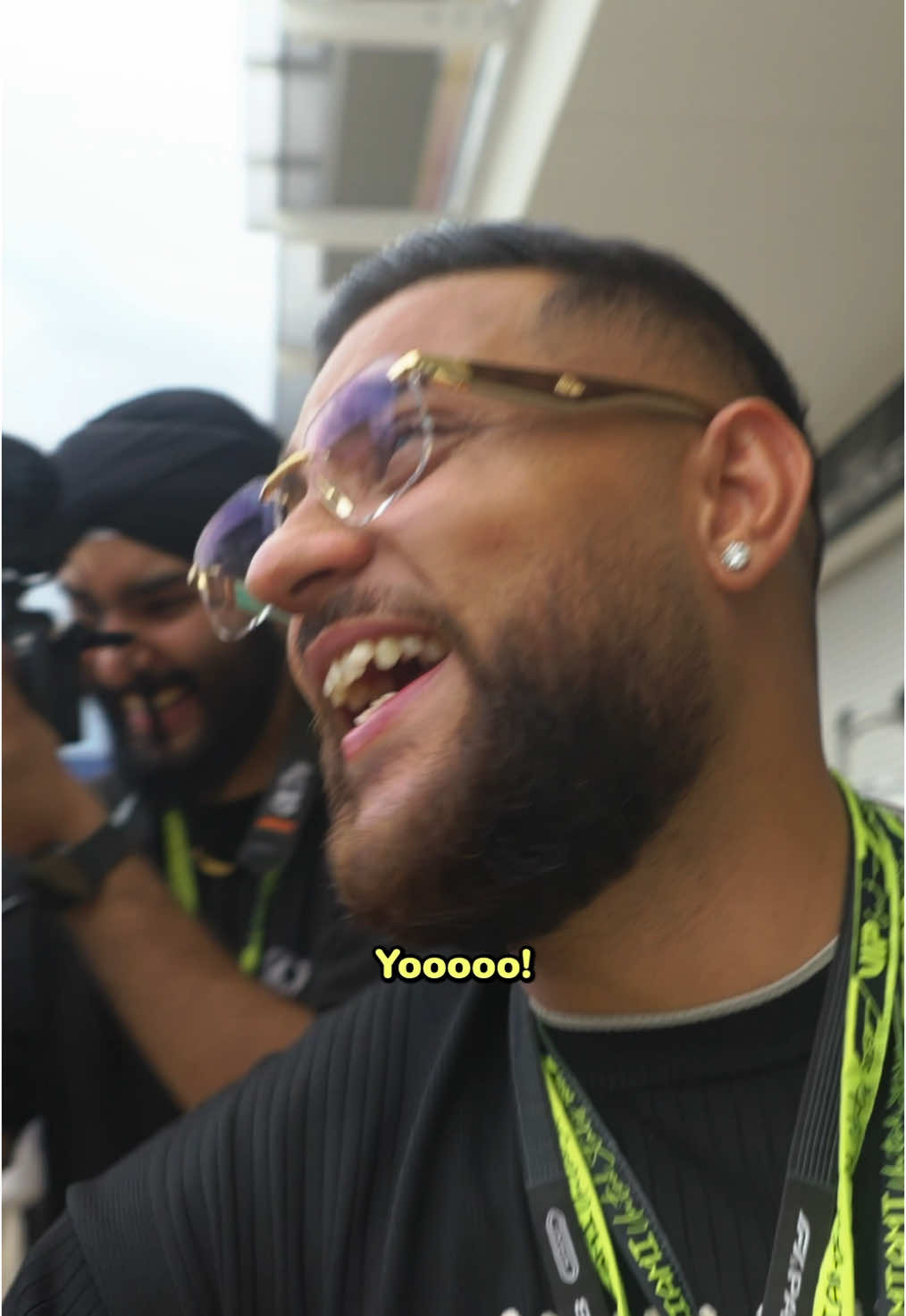 A post by @theandrewschulz on TikTok caption: Chopped it up with @KARAN AUJLA at F1 Miami. Might have to throw a surprise set in Punjab now. 👀  Shoutout @Stake F1 Team KICK Sauber for making the trip happen! New vlog live on my YouTube. Go watch it. Indulge! 💪  #andrewschulz #fyp #f1 #karanaujla_official #punjab #punjabi #punjabisong 