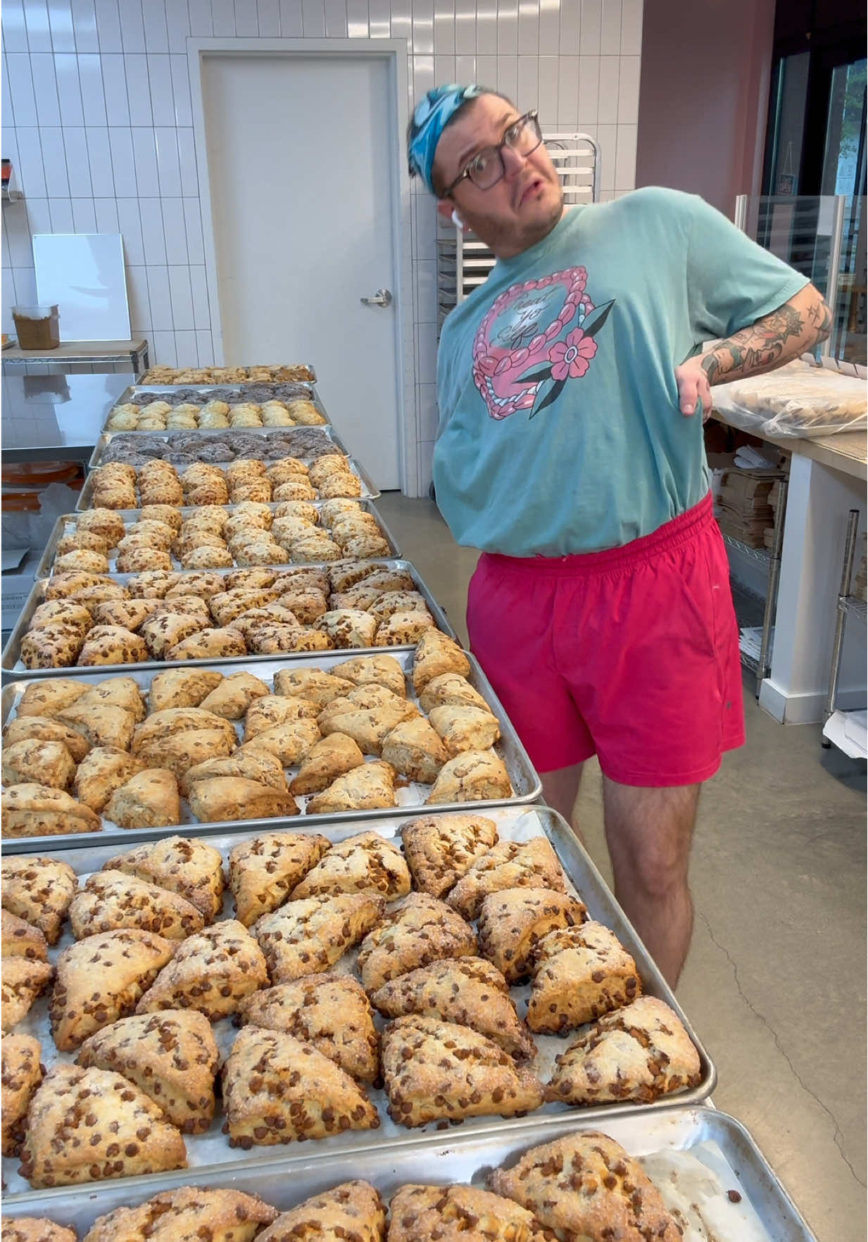 A post by @trashyqweenz on TikTok caption: Ordering this many scone is now against company policy 😆 #scones #blueberryscones #bakersoftiktok #overit 