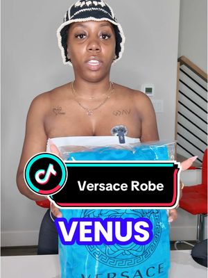 A post by @essessachee on TikTok caption: Get you a Versace Robe from @venus_ortizy2 on IG!! #fashion #clothes #versace #thesherellhodge #essessache 