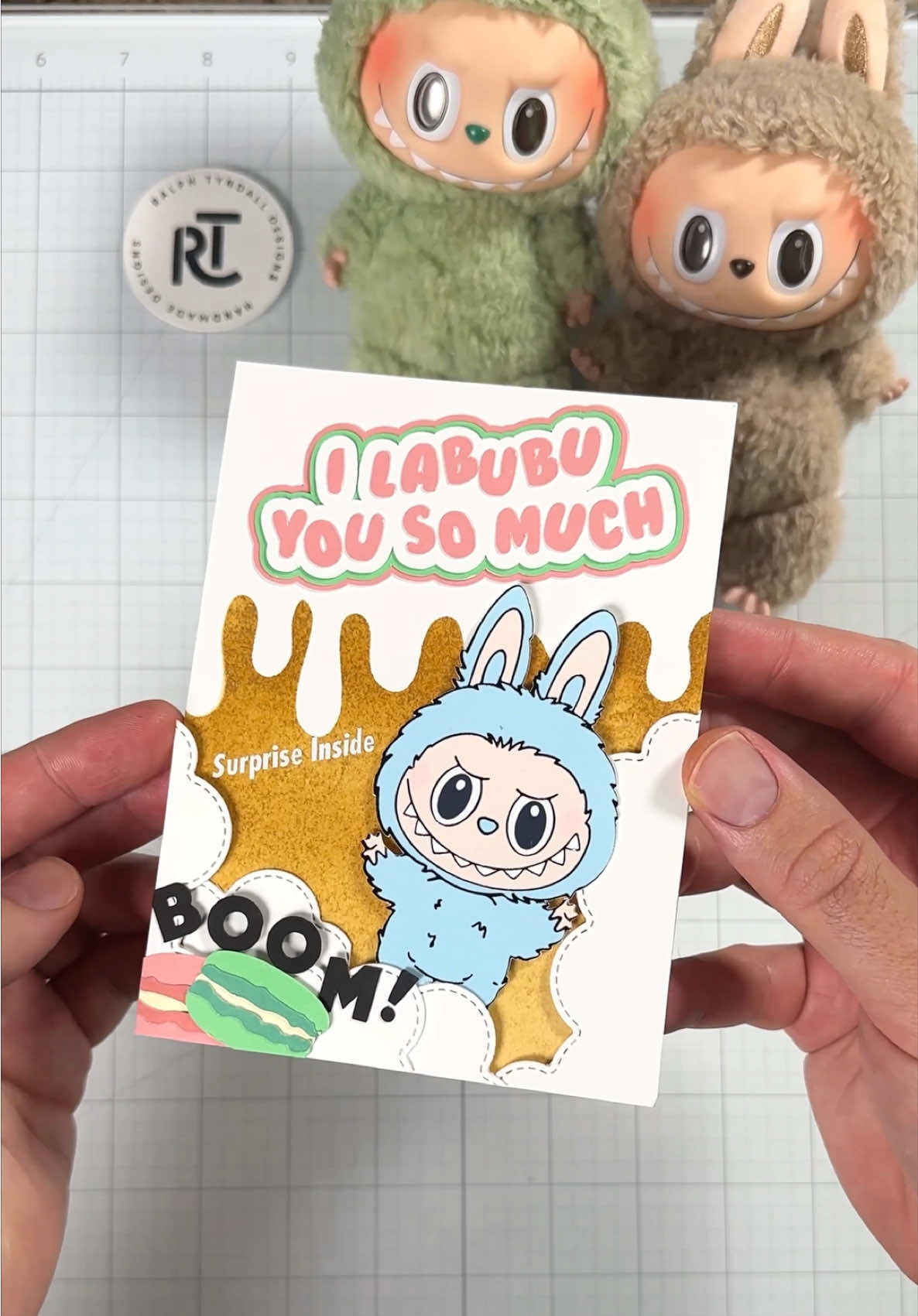 A post by @ralphtyndall on TikTok caption: Replying to @kale1229 …say less 😌 Ok honesty hour. My partner Adam has been obsessed with Labubu for months now and I thought they were so weird looking, but slowly the labubu bug bit me and I’m fully on the bandwagon now. I finally secured two blind boxes last week (one for each of us) 🤪 #labubu #labubuthemonsters #cardmaking #asmr #Art #craft 