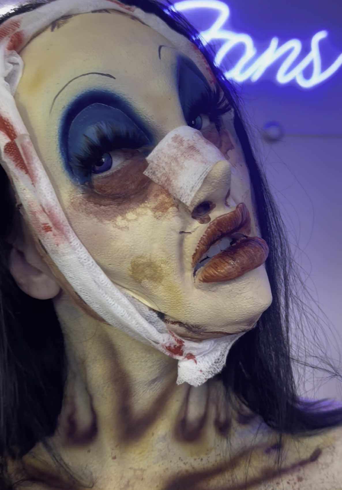 A post by @zombae.undead on TikTok caption: BOTCHED 💉💉 #sfx #horror #makeup #foamlatex #airbrush #prosthetic (application @infected_fx )