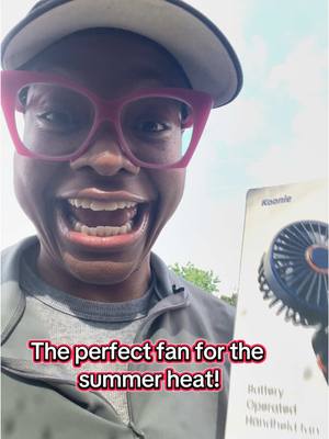 A post by @heyimdee_ on TikTok caption: The perfect handheld fan to help beat the summer heat! #personalfan #minifans #hotoutside #summerheat 
