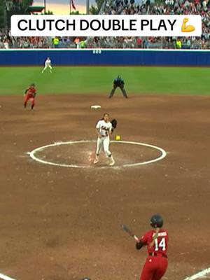 A post by @secnetwork on TikTok caption: #OleMiss #defense with a big #doubleplay when the bases are loaded 👏 #wcws #clutch 