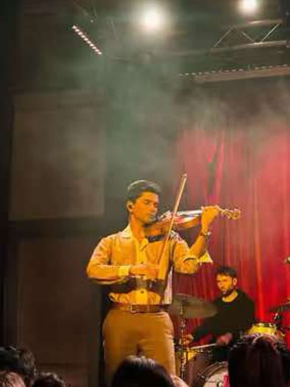 A post by @joelsvnny on TikTok caption: deluluminary in london🌞what a magical night this was… #luminary #acotar #editaudios #BookTok #marvel #fyp #indianviolin #xyzcba