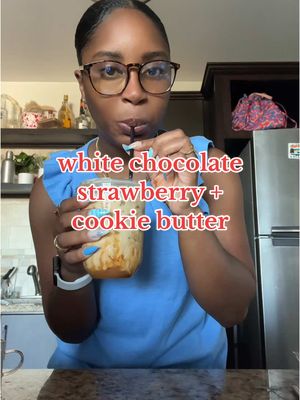 A post by @kmaeleee on TikTok caption: Replying to @Jen new iced latte recipe unlocked:  nespresso white chocolate strawberry pod + coffee bean and tea leaf cookie butter powder 🍪🥠🧈🍰🍓
