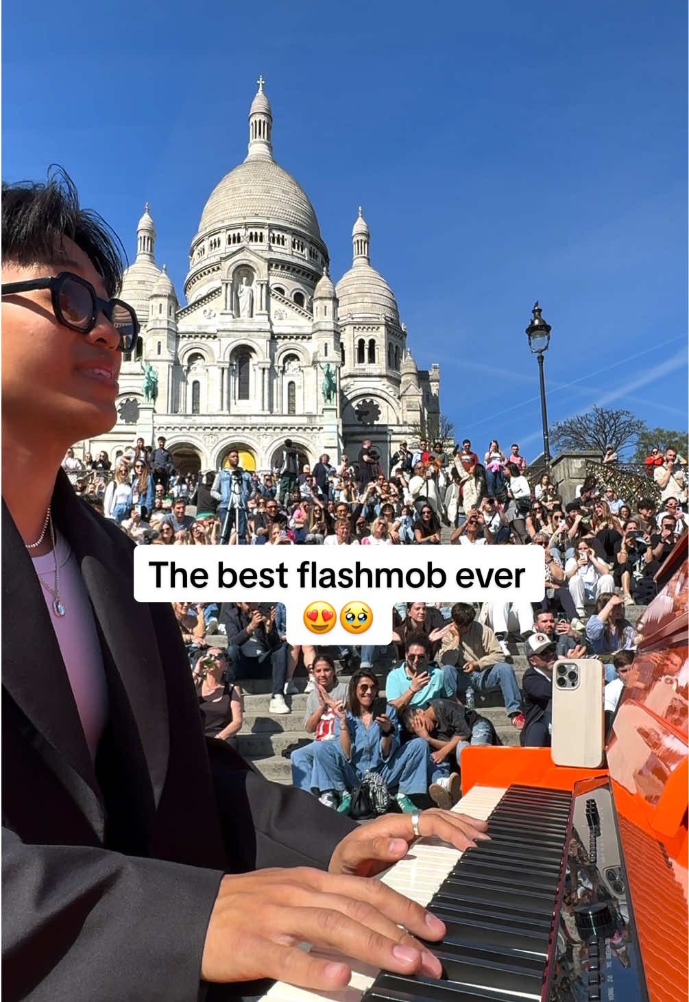 A post by @vantoan___ on TikTok caption: The best flashmob 🥹❤️ Wait for it… 🕊️  #Piano #flashmob #peace #pianocover #singer  Thanks 🙏   Sankofa Unit 🎤 @Lou_Ise_Kim 🎤