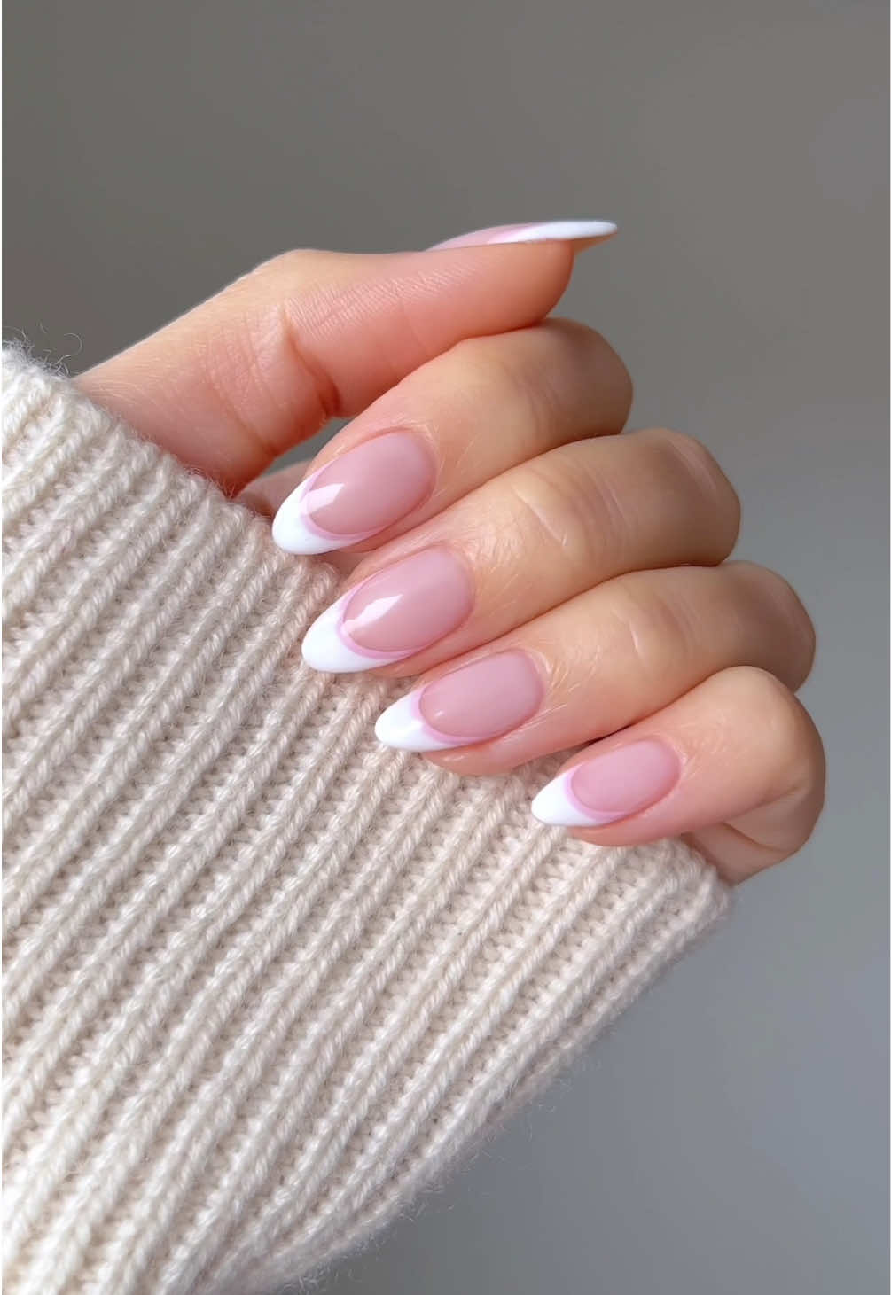 A post by @nailsbyalsn on TikTok caption: my favourite 🦢🎀🏹🤍  Using @GELCARE®  Nude Bb Creme French Alps Manoir Pink * code: NAILSBYALSN to save @Grown Alchemist day cream *aff #frenchtips #gelnails #nailinspo 