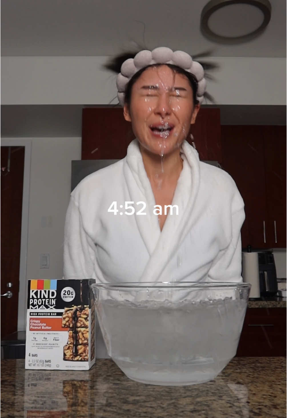 A post by @pepperonimuffin on TikTok caption: #KINDPartner #GRWM @KIND Snacks is fueling my mornings lately — post-run, post-ice bath, pre-chaos
