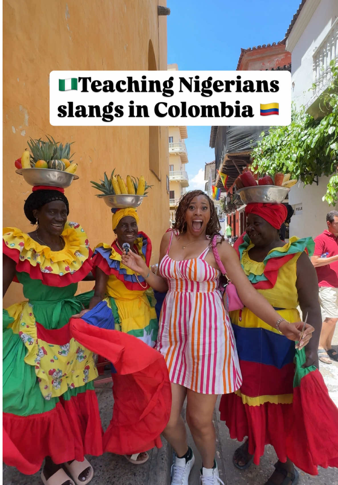 A post by @dreaknowsbest on TikTok caption: The last guys had me shook !🤯Teaching people Nigerian slangs in Colombia! 🇨🇴🇳🇬  Everyone was a vibe 💃🏽🤣  how did they do ?  #culturetiktok #culture #slangs #nigeria #colombia #cartagena #trending 