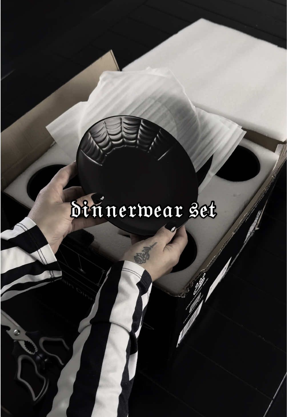 A post by @evdreadful on TikTok caption: the most perfectly 𝔡𝔯𝔢𝔞𝔡𝔣𝔲𝔩 dinnerware set for our new home 🕸️ thank you endlessly @Nomnu’s Dark Side  #gothdecor #homedecor #alt #aesthetic #bruja #dinningroom 