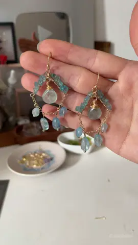 A post by @likayjewel_diylilylin on TikTok caption: Blue elf gemstones drop earrings 🐬🐳🩵✨💙#handmadejewelry #tutorial #dropearrings #handmadeearrings #summerjewelry #blue #earringslovers #jewellery #foru #earringcollection #summer #gemstone #aquamarine 
