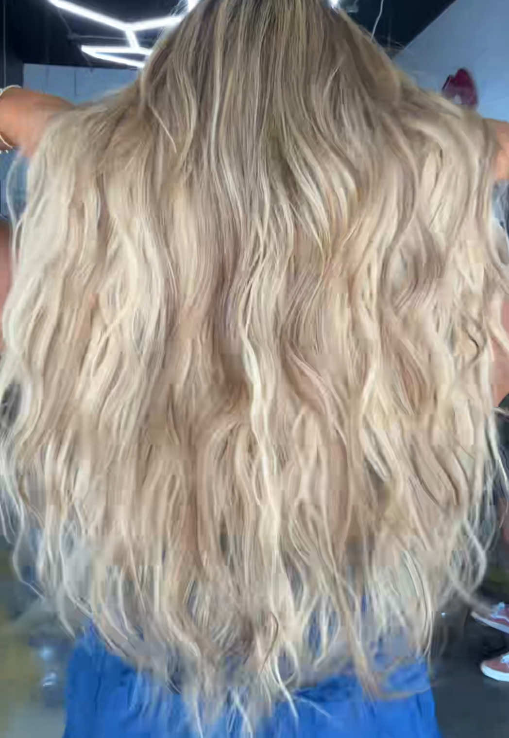 A post by @sammiefoo1 on TikTok caption: Replying to @Rachel_Bynum we heard you guys ! We added volume wefts instead of the genius wefts and put some tapes at the front hairline to blend the color and length. I think this turned out amazing!!! #hairextensions #weftextensions #blonde 