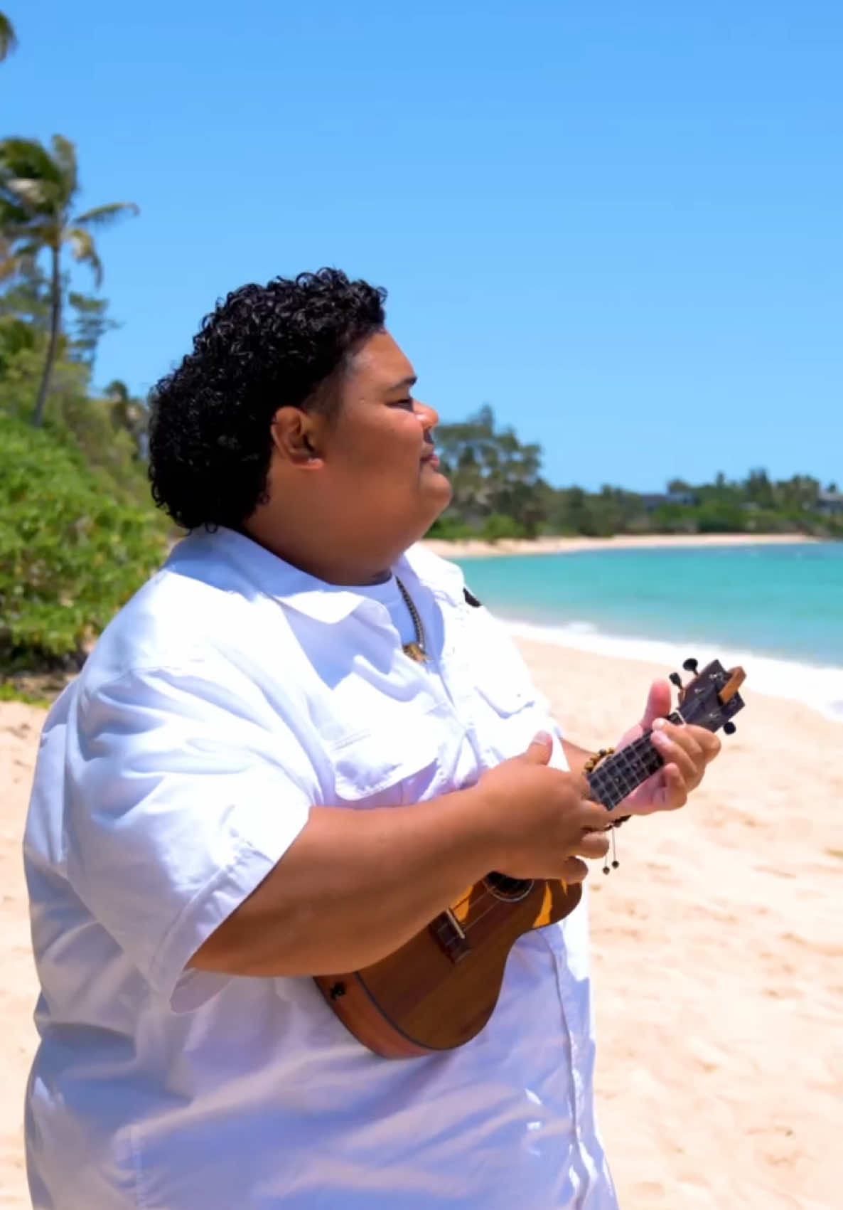 A post by @wtongi on TikTok caption: Life is a roller coaster ride, and I’m grateful to be on it 🎢 Thank you to Disney for giving me the opportunity to record this new version of a song that was a staple of my childhood. I hope I did it justice. And shout out to the kids in the Kamehameha Schools Children's Chorus... they crushed it 🤙🏽 #behindthesong #liloandstitch #disney