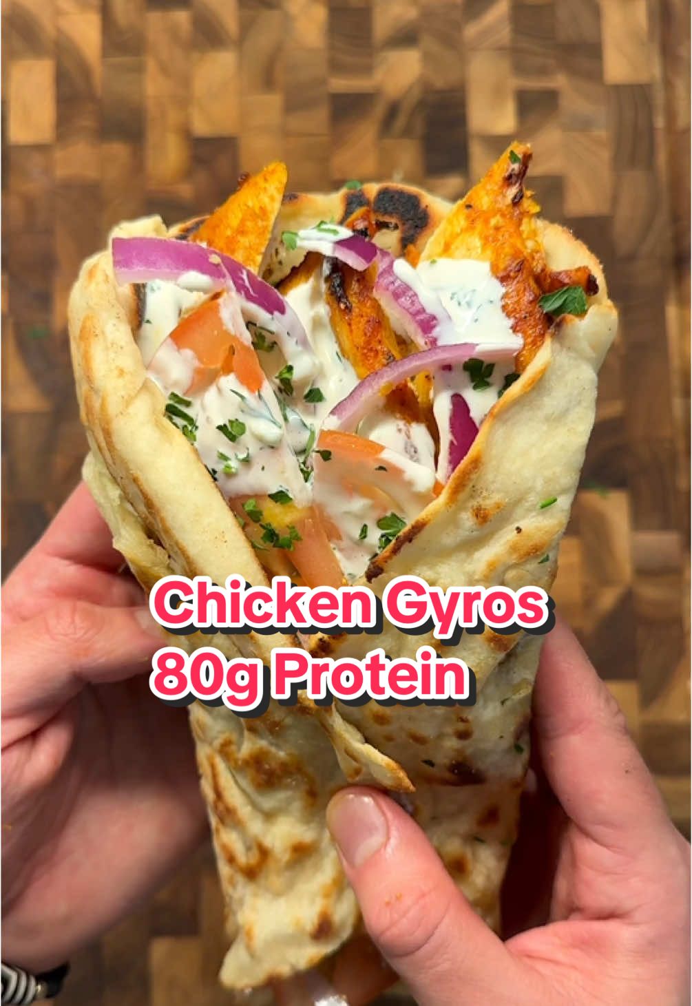A post by @ice.karimcooks on TikTok caption: High Protein Chicken Gyros w Garlic Flatbread (Recipe 👇🏽) IB: @_aussiefitness the GOAT 🐐 🔥  Macros per gyro: 620 calories |80g P | 53g C | 7g F Chicken Gyros 	• 1lb Chicken Breast, thinly cut 🍗 	• 1/2 cup Non Fat Greek Yogurt l 	• 1 lemon, juice and zest 🍋 	• 3 cloves minced Garlic 🧄  Seasonings:  S&P, to taste 1 tsp cumin 1 tsp smoked paprika  1 tsp onion powder Skewer an onion with 2 skewers alternate the chicken then Bake at 425°F for 25-30 minutes, alternatively you can skip this method and air fry at 400°F for 12-15 mins! Tzatziki Sauce: 	• 1 cup Non Fat Greek Yogurt 🍦 	• 2 cloves minced Garlic 🧄 	• 2-3 tbsp Chopped Dill 🌿 	• 1/2 cup Freshly Grated Cucumber (squeezed dry), 🥒 	• Squeeze of Lemon Juice 🍋 	• Salt, 1/2 tsp 🧂  Taste and adjust! Garlic Flatbread: (makes 1 large flatbread) 	• 60g Self Raising Flour (or plain flour with 1 tsp baking powder & salt) 🍞 	• 75g Non Fat Greek Yogurt 	• 1 tsp garlic powder 	• 1/2 tsp salt Mix and let sit for 10-15 mins then cook in pan on medium high heat for 2 mins per side or until brown. Brush lightly w melted butter and some garlic mixed together (optional) To assemble: Half the chicken sliced thin Tzakziki 🥒  Tomatoes 🍅  Red onions 🧅  Parsley, 🌿 (optional) Enjoy 😍 . . . . #icekarim #healthyrecipes #easyrecipes #mealprep #quickrecipes 