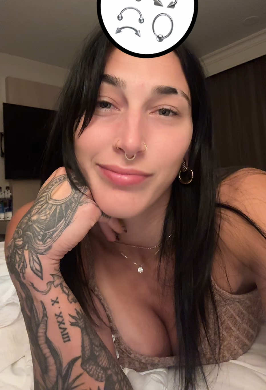 A post by @rhearipley_wwe on TikTok caption: Yeah, Nah, I’m good ay… Seems painful. 💀 #Piercings 