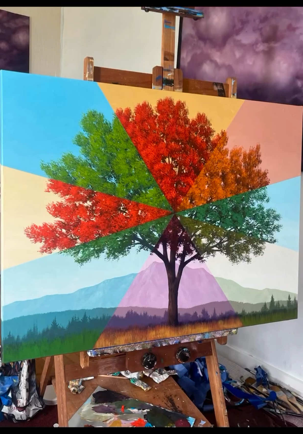 A post by @fenonart on TikTok caption: @gagnonstudio Revisiting one of my popular timeline tree paintings I did last summer.  Looking forward to creating a lot of new work this summer.  Enjoy!  #painting #timeline #tree #Art #timgagnon #seasons #foliage #unique #contemporaryart #landscape #surreal #abstract