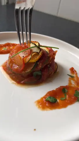 A post by @ on TikTok caption: Ratatouille 🥒🍅🌿 #ratatouille #EasyRecipe #Recipe #food #france🇫🇷 #cuisine 
