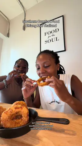 A post by @miraspiveytravels on TikTok caption: Cluck Southern Comfort Food In Chiang Mai Thailand💕💖🔥🍲 #thailand #livinginthailand #fyp #soulfood 