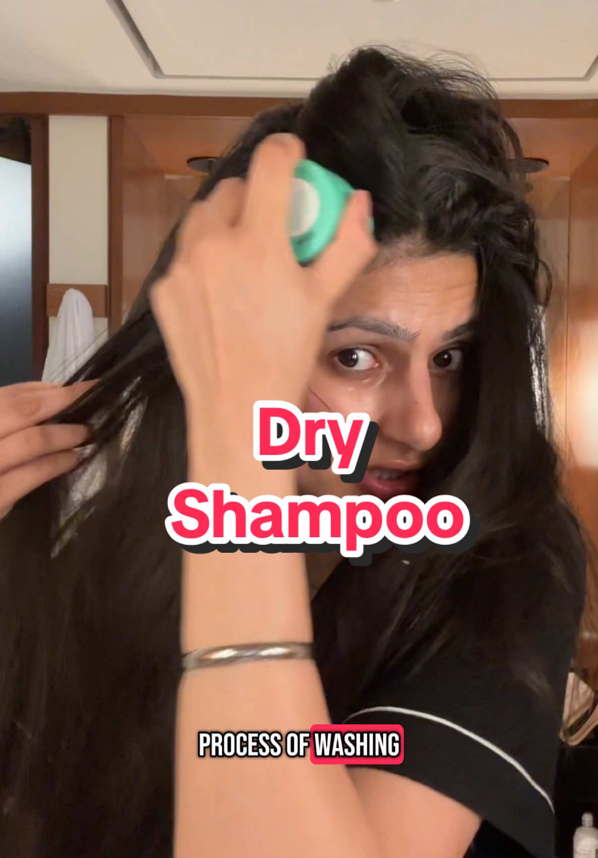A post by @glambygilly on TikTok caption: Am I the only one that doesn’t like my hair on vacation 👀 @Briogeo #grwm #dryshampoo #hairtok 