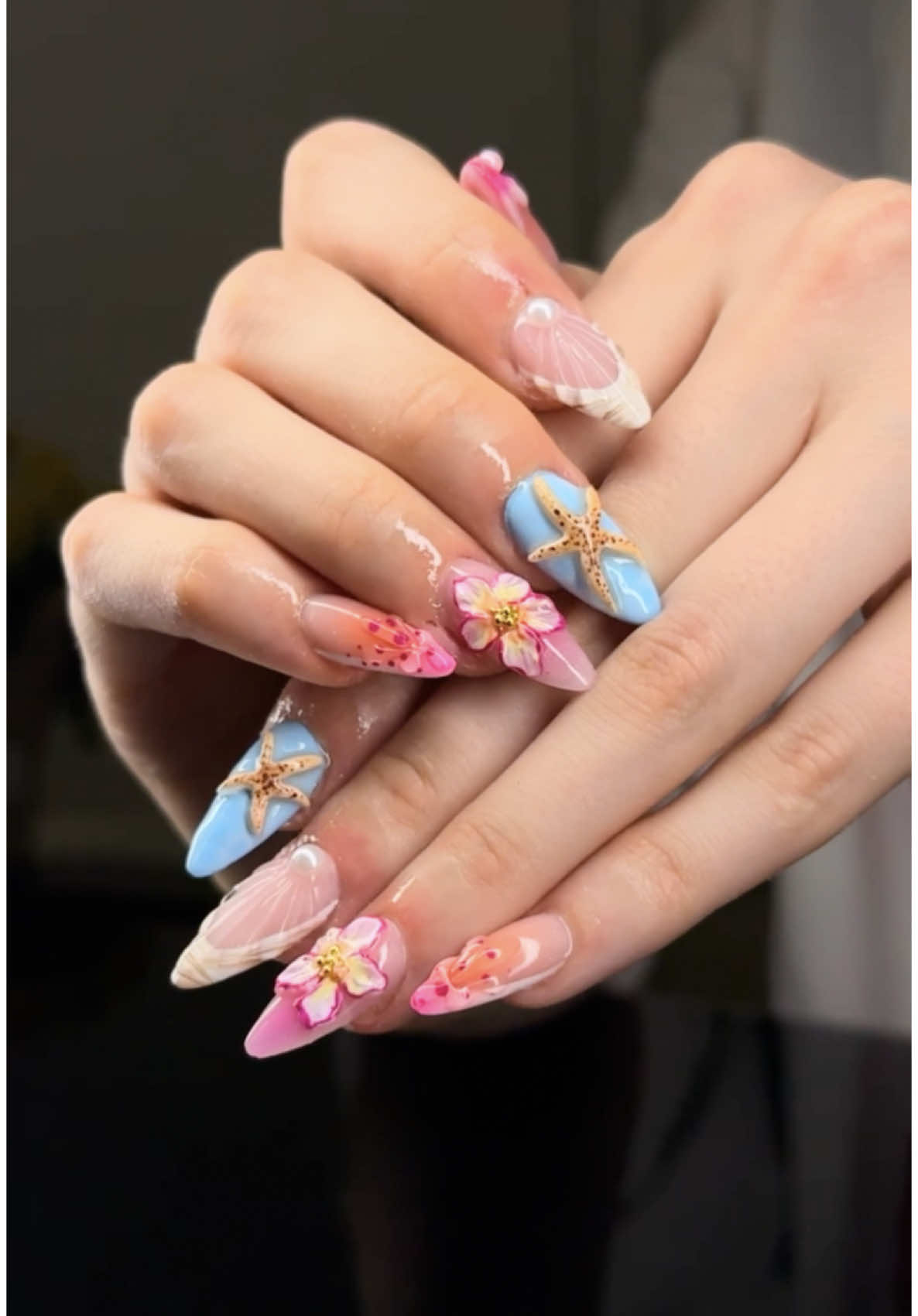 A post by @savsgotcake on TikTok caption: Nails for the Girls Trip💅🏻🌸🐚✨  Nails by @celizdoesnails on instagram! #nailart #nailtech #nails #nailsdesign #vacationnails #nailinspo #nailtok 