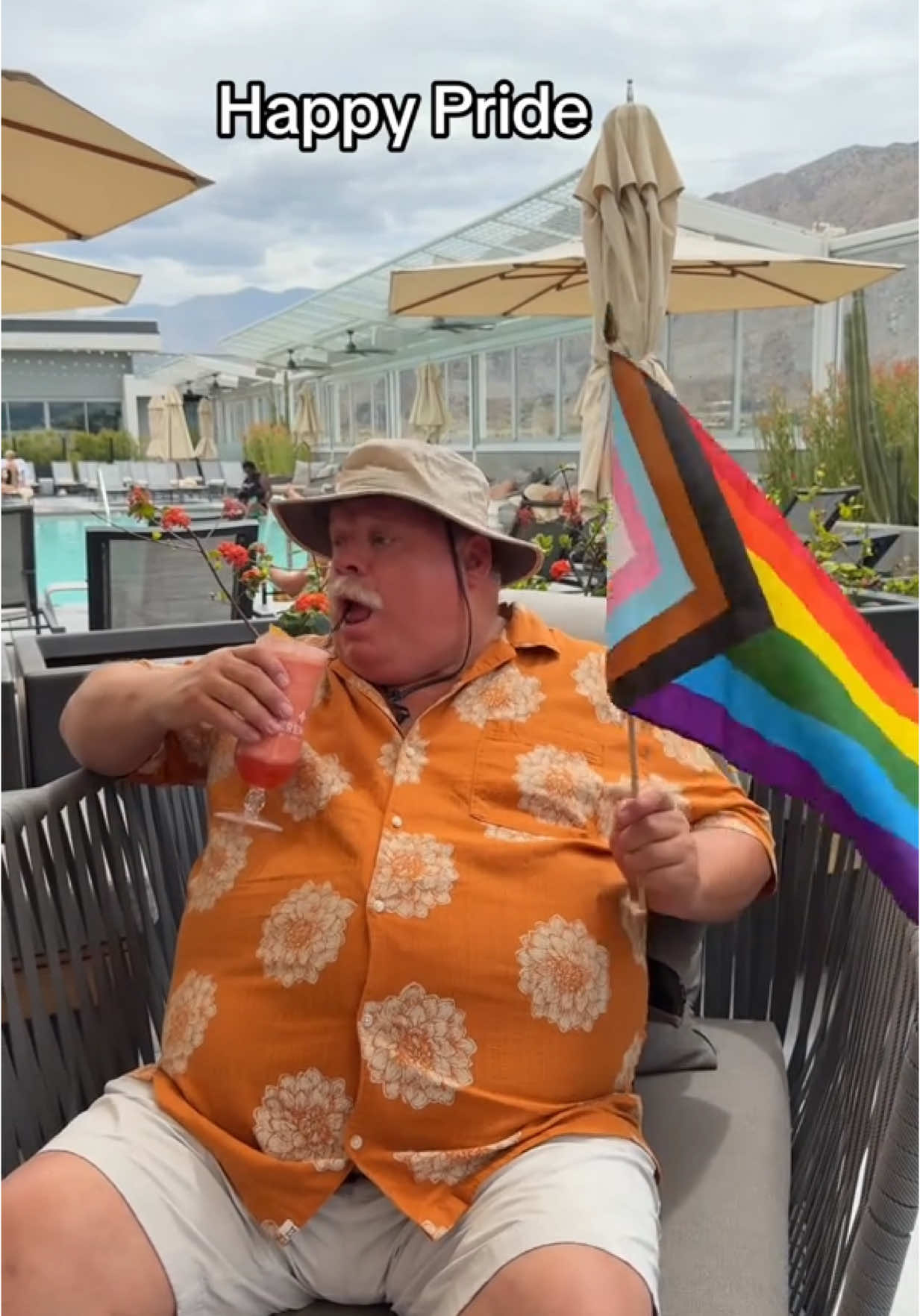 A post by @chamberlin_kevin on TikTok caption: I’ve been to so many parades in my life, this year I’m celebrating pride White Lotus style 🏳️‍🌈 🏳️‍⚧️  #happypride #protectthedolls 