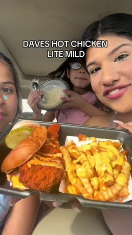 A post by @arimonika on TikTok caption: TRYING DAVES HOT CHICKEN LITE MILD 🍗 🌶️ #daveshotchicken #daveshotchickenreview #daveshotchickenmukbang #daveshotchickenlitemild #restaurantreviewwithari #family 