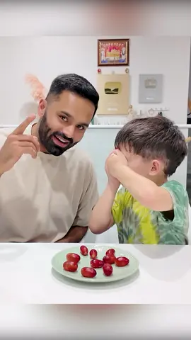 A post by @themodernsinghs on TikTok caption: Poison skittles game (substituted with grapes🤣) challenge with Noah this time!! Be sure to check out the YouTube vlog of us doing this with the whole family! ❤️  #fyp #skittleschallenge #trend #nz 