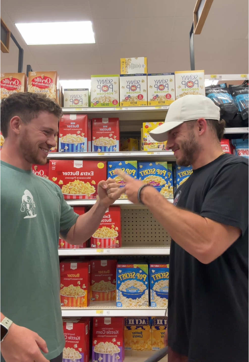 A post by @average_jake_ on TikTok caption: He was suprised I’ve never had corn nuts before 🤔 #fyp #foryou #xyzabc #couples #datenight #mlm #lgbt 
