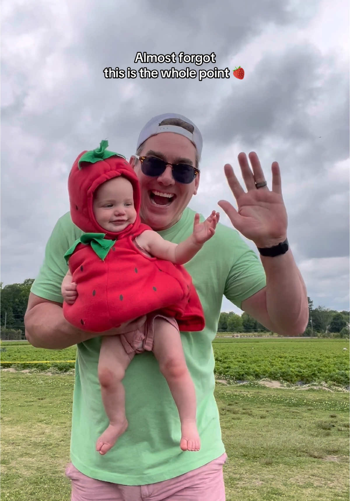 A post by @rachsullivan__ on TikTok caption: Nothing cuter than a baby in a strawberry outfit at the strawberry patch 