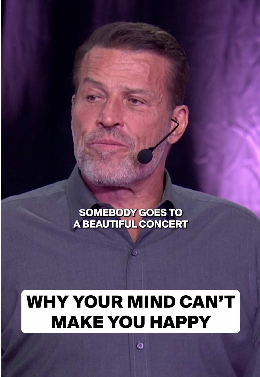 A post by @tonyrobbins on TikTok caption: Your brain is not designed to make you happy. That's your job. #happiness #gratitude #personalgrowth #mindfulness #danielkahneman 