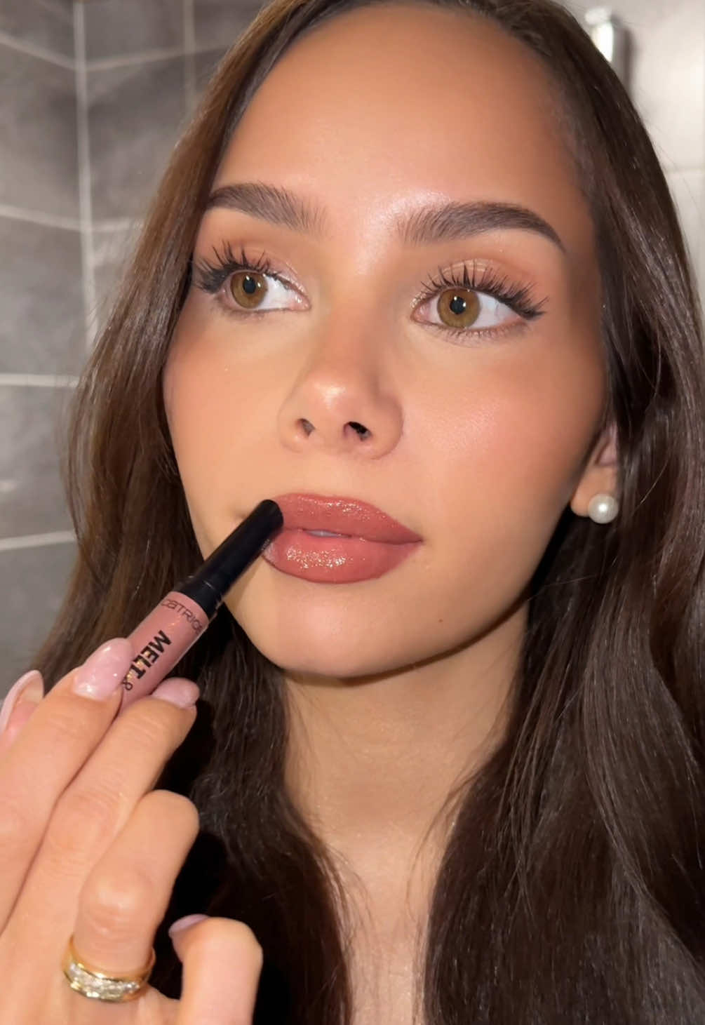 A post by @jennatanisha on TikTok caption: Catrice never disappoints 😚 Mainos @catrice.cosmetics  My drugstore must-haves!! All 10/10 & affordable 👼🏻 Product list: Soft Glam Filter Fluid True Skin Concealer Under Eye Brightener Powder Brow Fix Soap Stick Liquid Bronzer Blushin’ Charm Multi Stick More Than Glow Highlighter Plumping Lip liner Melt & Plump Juicy Lip Plumper #ownyourmagic #CatriceCosmetics #Catrice #makeup 
