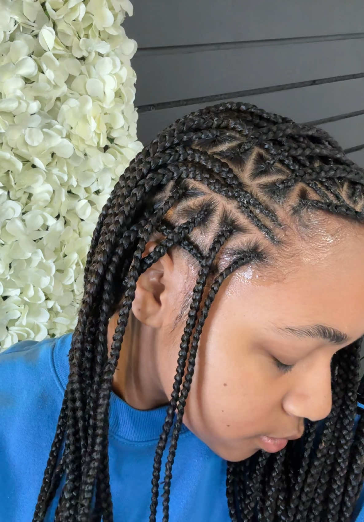 A post by @joiya.lanae on TikTok caption: Last minute braids for the winnnn! Thanks to @faryhairbraiding in Michigan #braidstyles #fulanibraids #fulani #vacationbraids 